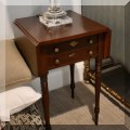 F56. Drop leaf side table with two drawers and turned legs. 